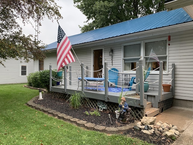 6645 Oak Dr, Celina, OH 45822 - back of property with a yard, a metal roof, and a deck