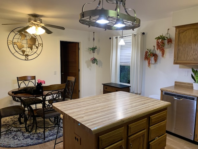 6645 Oak Dr, Celina, OH 45822 - kitchen featuring dishwasher, butcher block countertops, a center island, light wood finished floors, and a ceiling fan