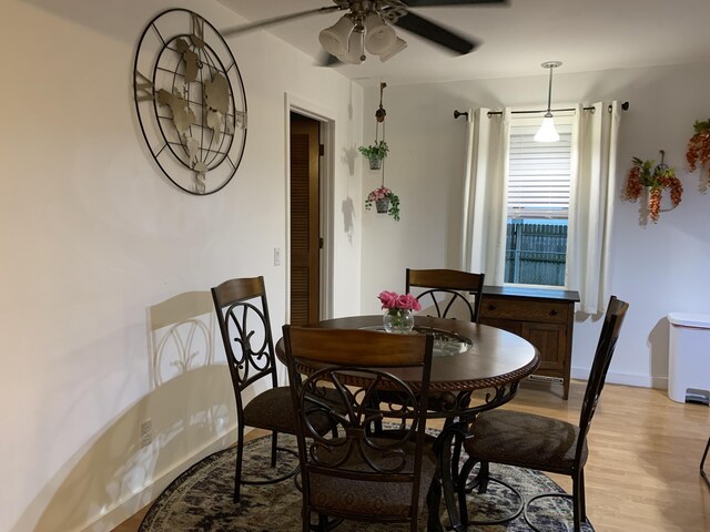 6645 Oak Dr, Celina, OH 45822 - dining area featuring a ceiling fan and light wood-style flooring