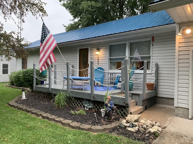 6645 Oak Dr, Celina, OH 45822 - view of front facade featuring a metal roof and a wooden deck