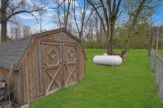 view of shed with fence