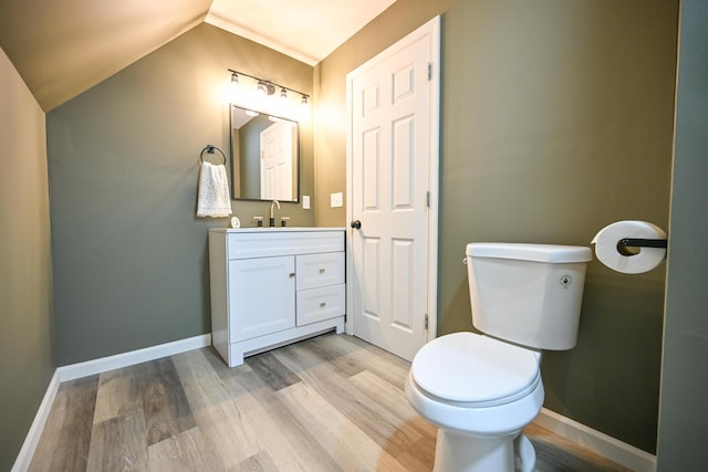 8095 N Lena-Palestine Rd, Conover, OH 45317 - half bath with wood finished floors, vanity, and vaulted ceiling