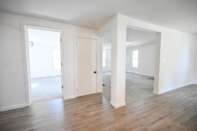 8095 N Lena-Palestine Rd, Conover, OH 45317 - empty room with wood finished floors and a smoke detector