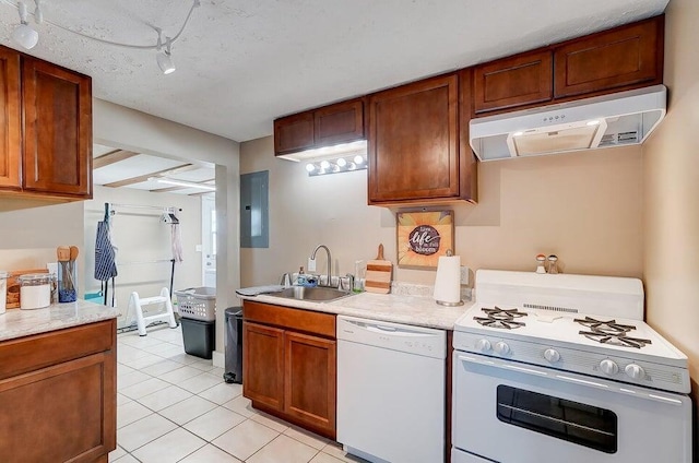 kitchen featuring sink, light tile patterned floors, electric panel, and white appliances