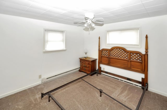 bedroom featuring carpet floors, baseboards, a baseboard heating unit, and ceiling fan