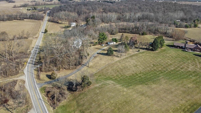 birds eye view of property featuring a rural view