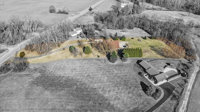 birds eye view of property featuring a rural view