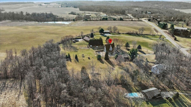 drone / aerial view with a water view and a rural view