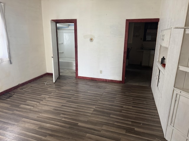 925 Sherman Ave, Springfield, OH 45503 - spare room with dark wood finished floors and baseboards