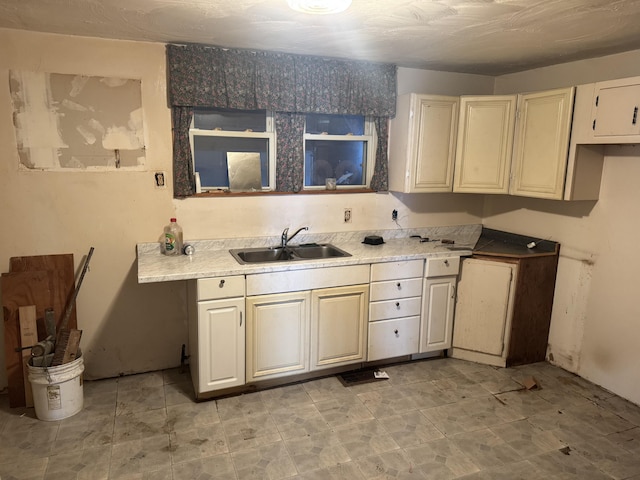 925 Sherman Ave, Springfield, OH 45503 - kitchen featuring light countertops and a sink