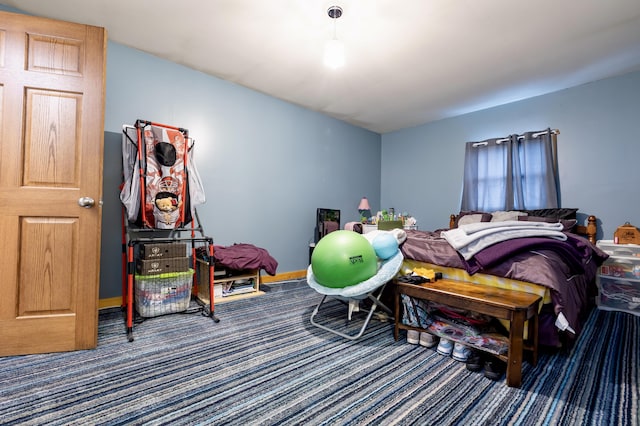 bedroom featuring carpet