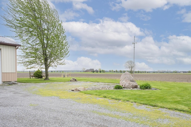 view of street featuring a rural view