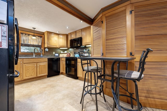 kitchen with recessed lighting, pendant lighting, black appliances, and beamed ceiling