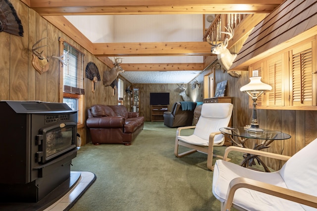 carpeted living area featuring wooden walls and beamed ceiling