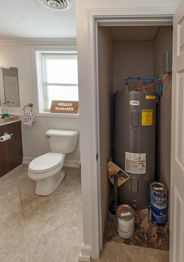 bathroom with tile patterned flooring, toilet, vanity, baseboards, and water heater