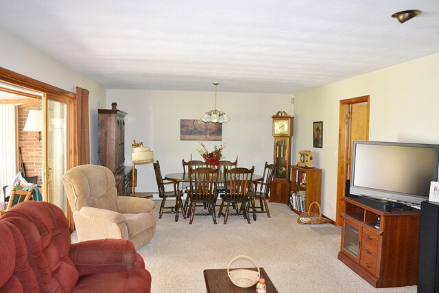 dining room with light colored carpet