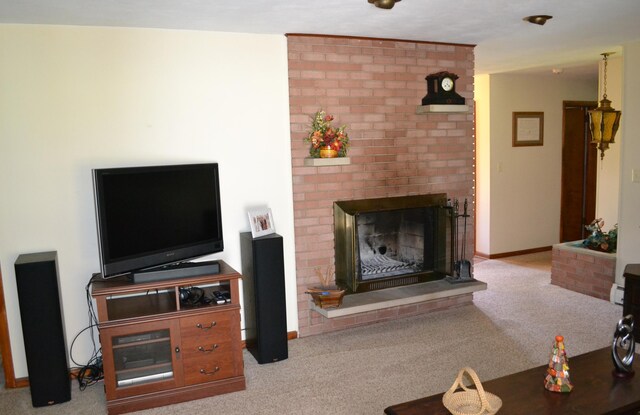 living room featuring baseboards, carpet, and a brick fireplace