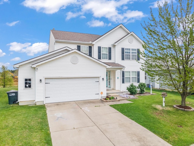 traditional-style house with a garage, a shingled roof, a front yard, and concrete driveway