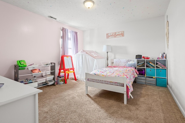 carpeted bedroom featuring visible vents