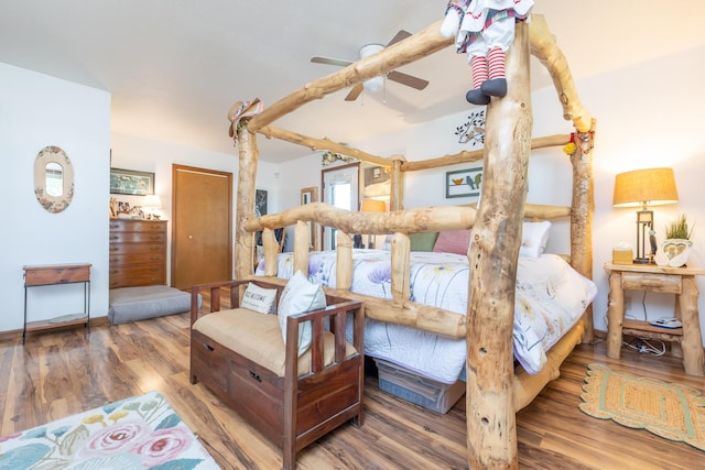 8339 Hite Rd, West Liberty, OH 43357 - bedroom featuring wood finished floors, baseboards, and ceiling fan