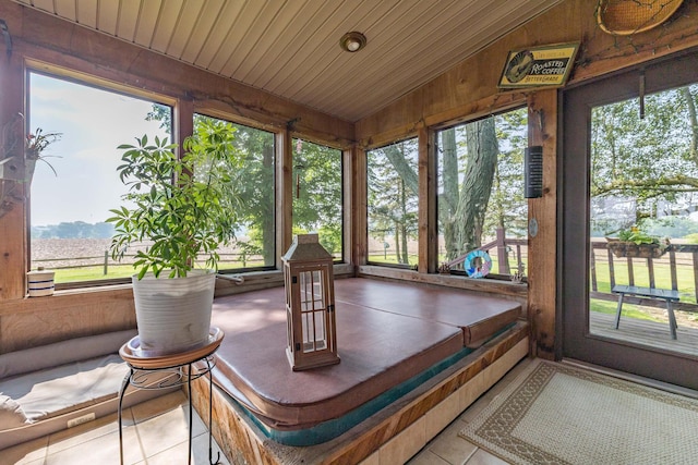 8339 Hite Rd, West Liberty, OH 43357 - sunroom / solarium with tile patterned flooring, plenty of natural light, wooden walls, vaulted ceiling, and wood ceiling