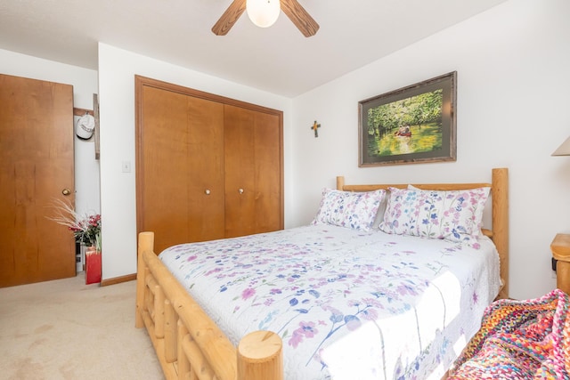 8339 Hite Rd, West Liberty, OH 43357 - bedroom with light carpet, a closet, and a ceiling fan