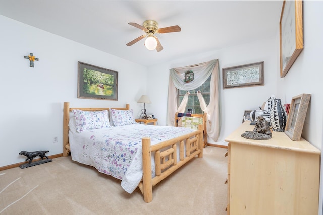 8339 Hite Rd, West Liberty, OH 43357 - bedroom with light colored carpet, baseboards, and a ceiling fan