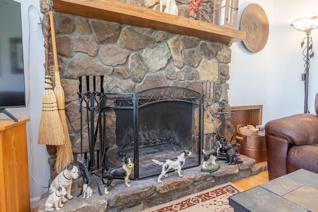 8339 Hite Rd, West Liberty, OH 43357 - detailed view of a stone fireplace and wood finished floors