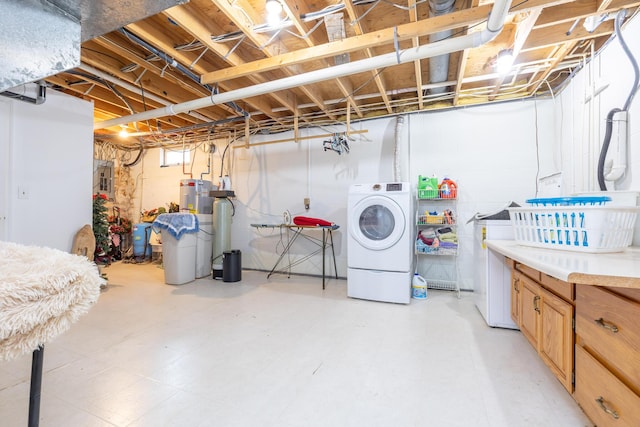 8339 Hite Rd, West Liberty, OH 43357 - unfinished basement with washer / clothes dryer, water heater, a water pressure tank, electric panel, and a water softener