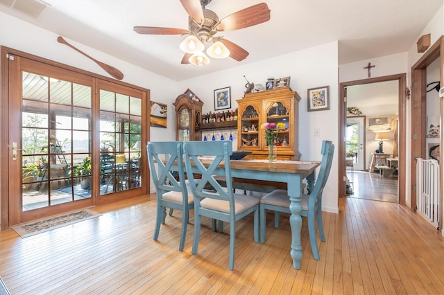 8339 Hite Rd, West Liberty, OH 43357 - dining room featuring a ceiling fan, healthy amount of natural light, and light wood-style flooring