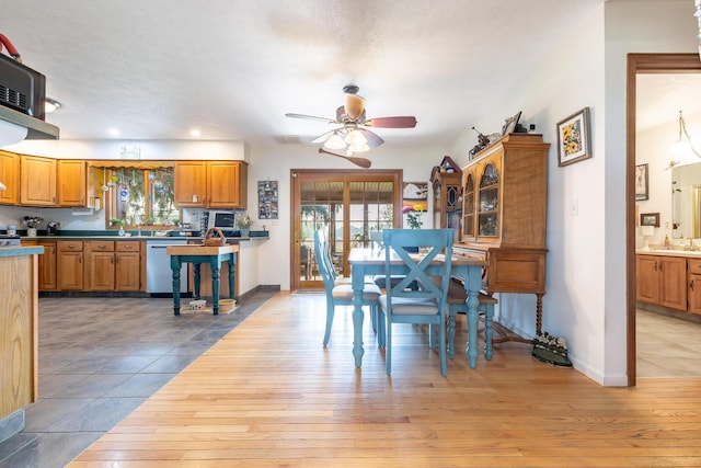 8339 Hite Rd, West Liberty, OH 43357 - dining room featuring light wood-type flooring, ceiling fan, plenty of natural light, baseboards, and recessed lighting