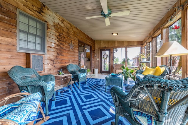8339 Hite Rd, West Liberty, OH 43357 - sunroom with plenty of natural light, wooden walls, ceiling fan, and wooden ceiling