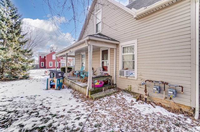 exterior space featuring cooling unit and a porch