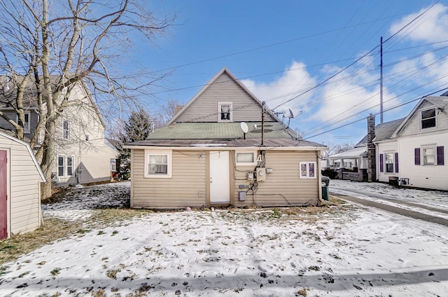 view of snow covered house