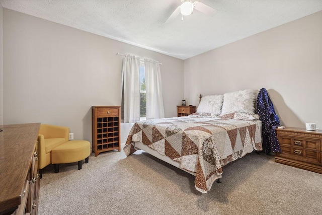 2909 W Barnhill Pl, Xenia, OH 45385 - carpeted bedroom with ceiling fan and a textured ceiling