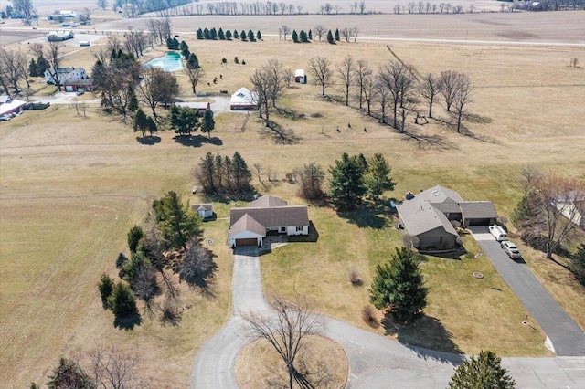 birds eye view of property featuring a rural view