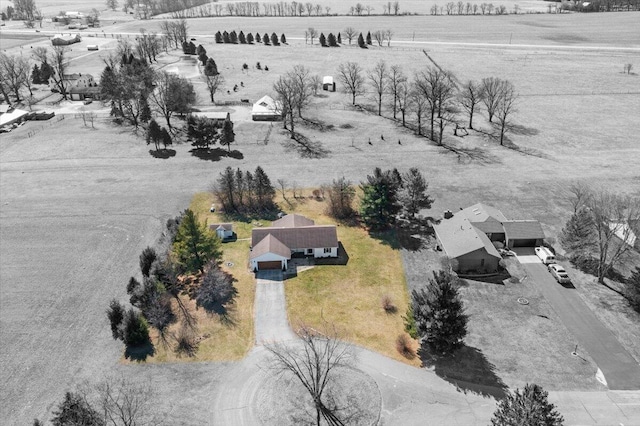 birds eye view of property featuring a rural view