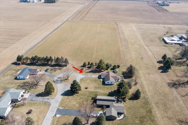 birds eye view of property featuring a rural view