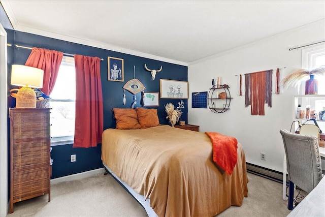 bedroom with crown molding, carpet, and baseboards