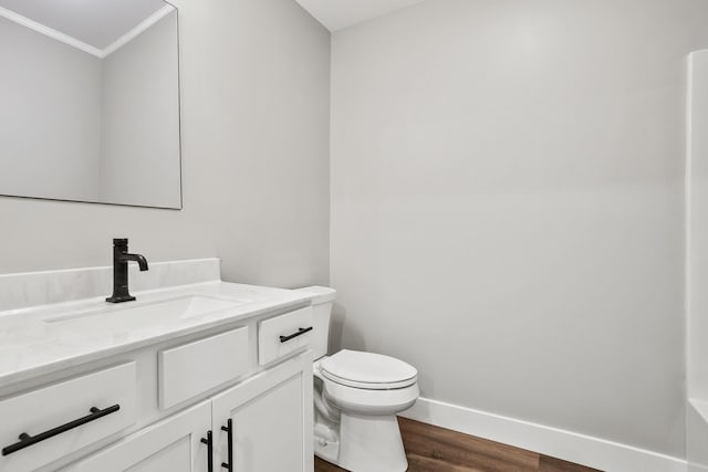 1160 Waterloo St, Troy, OH 45373 - bathroom with vanity, crown molding, and wood finished floors