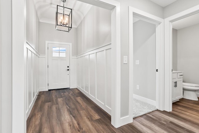 1160 Waterloo St, Troy, OH 45373 - entrance foyer with a chandelier and dark wood-style flooring