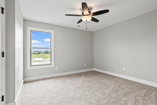 1160 Waterloo St, Troy, OH 45373 - carpeted spare room with baseboards and ceiling fan
