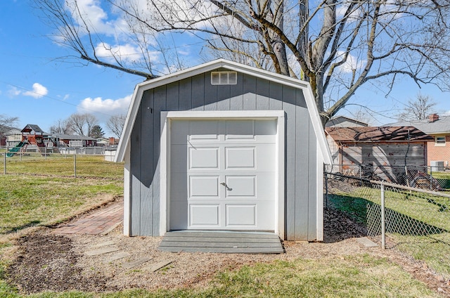 view of shed with fence