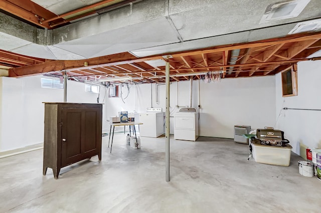 basement featuring washer and clothes dryer