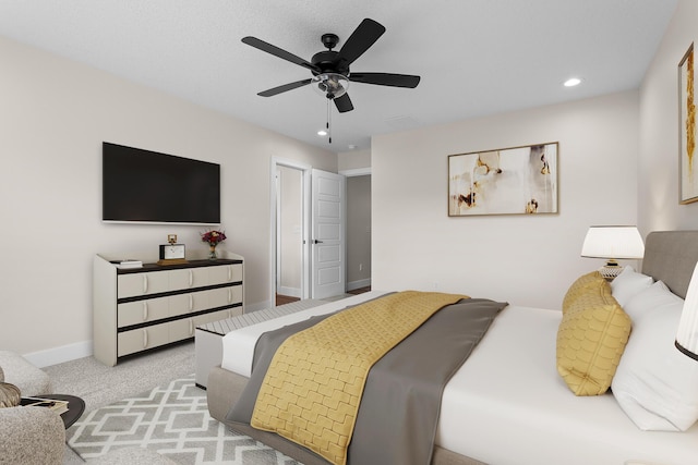 bedroom featuring recessed lighting, a ceiling fan, baseboards, and carpet flooring