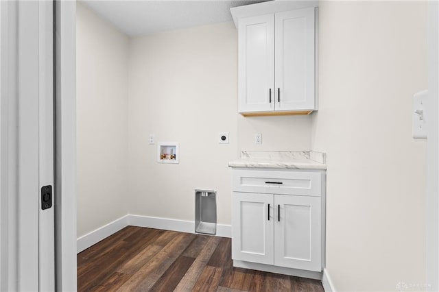 clothes washing area with cabinets, washer hookup, dark hardwood / wood-style flooring, and electric dryer hookup