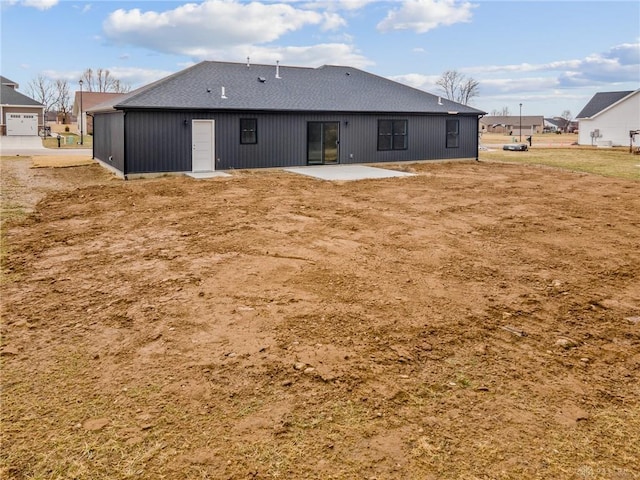 back of house featuring a patio area