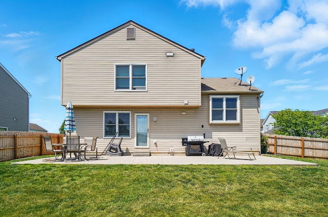 1627 Metcalfe Ave, Columbus, OH 43207 - back of house featuring a patio area and a fenced backyard