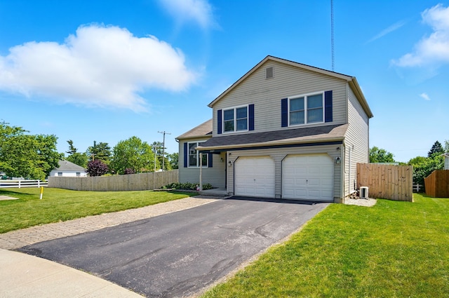 1627 Metcalfe Ave, Columbus, OH 43207 - view of front facade featuring a garage and asphalt driveway