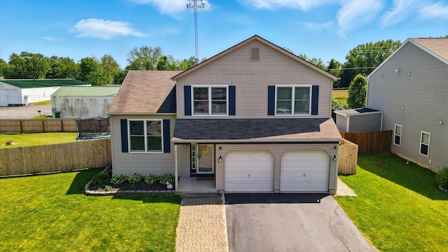 1627 Metcalfe Ave, Columbus, OH 43207 - tri-level home with driveway, a garage, a trampoline, and a shingled roof